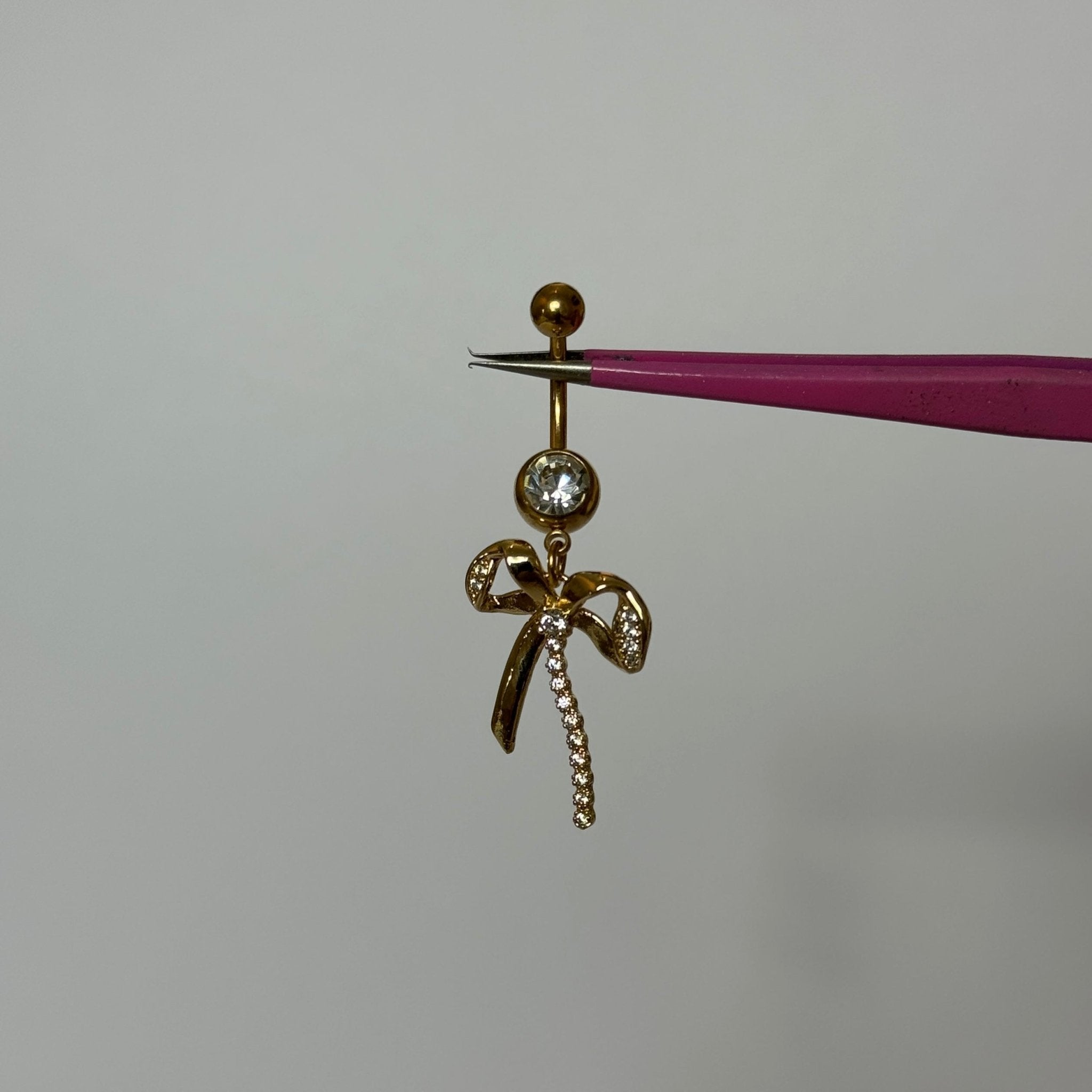 Gold Dangling Diamanté Bow Belly Bar - ILLUSIVE JEWELS