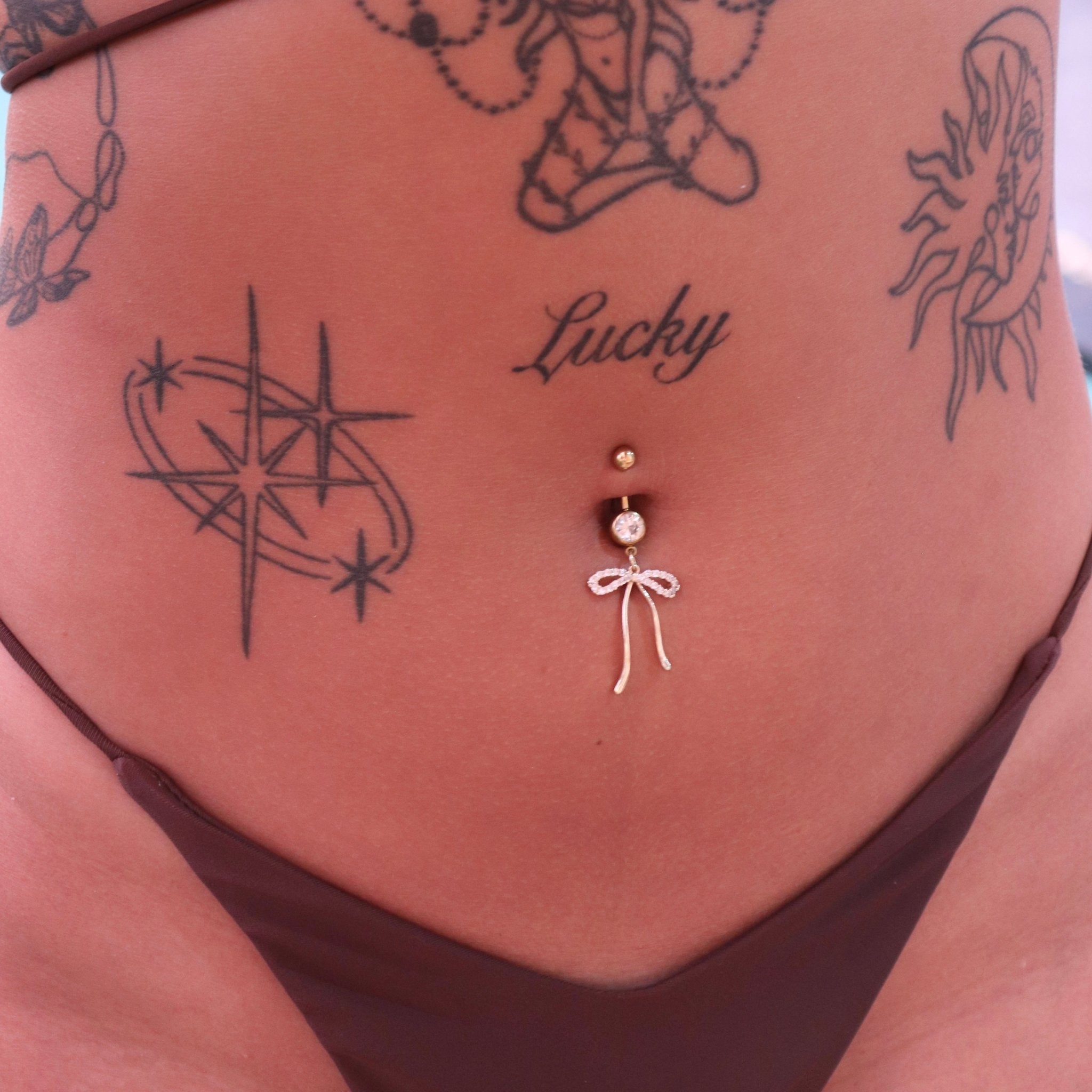 Gold Dangling Long Bow Belly Bar - ILLUSIVE JEWELS