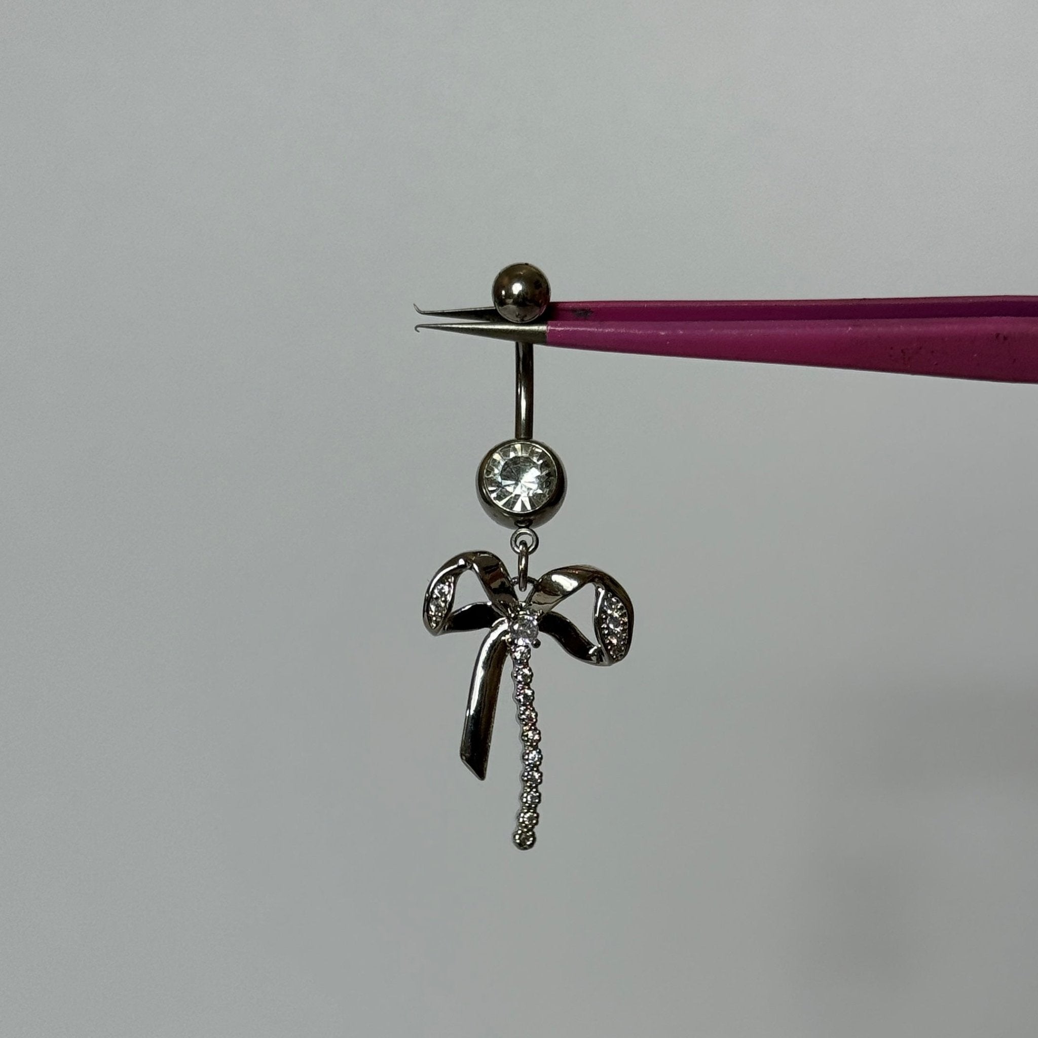 Silver Dangling Bow Belly Bar - ILLUSIVE JEWELS